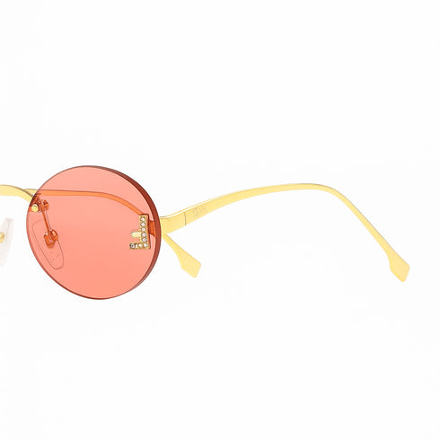 FENDIFendi FE4075US “First Crystal” Oval Sunglasses – 54mm Gold Metal FrameEYEWEAREcecile