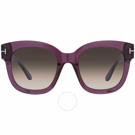 Lunettes de soleil Tom Ford FT0613 69K pour femme - monture bordeaux translucide, verres marron