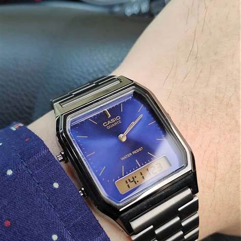 CASIO & VINTAGECasio Vintage AQ - 230EGG - 2AEF Unisex Analogue - Digital Watch – Blue Dial, Grey Stainless Steel BandWATCHESEcecile