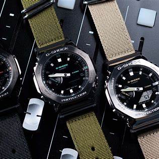 CASIO G - SHOCKCasio G - SHOCK GM - 2100CB - 3AER Men's Watch - 44.5mm, Black Resin Case with Stainless Steel Bezel, Green Fabric StrapWATCHESEcecile