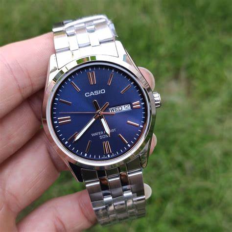 CASIO & VINTAGECasio MTP - 1335D - 2A2VDF Men's Watch - Blue Dial, Stainless Steel BandWATCHESEcecile