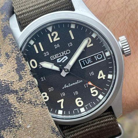SEIKOSeiko 5 Sports SRPJ85K1 Automatic Men's Watch - Black Dial, Green Nylon StrapWATCHESEcecile