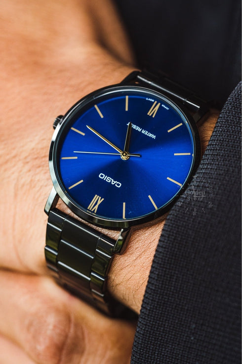 CASIO & VINTAGECasio MTP - VT01B - 2BUDF Men's Analog Watch – Blue Dial, Black Stainless Steel BandWATCHESEcecile