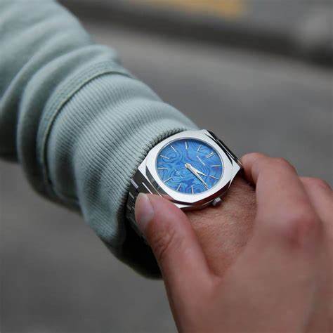 D1 Milano Ultra Thin Mokuti D1-UTBJMK Unisex-Uhr - Edelstahl, blaues Mokuti-Zifferblatt, 40 mm