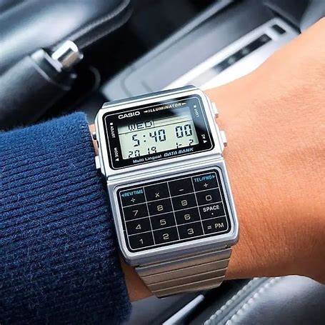 Casio DBC-611-1DF Reloj digital para hombre - Calculadora, banco de datos, correa de acero inoxidable