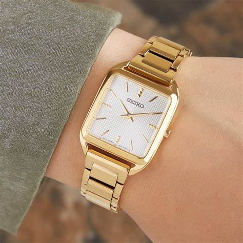 SEIKOSeiko SWR078P1 Women's Quartz Watch - Gold - Tone Rectangular Case, White Guilloché DialWATCHESEcecile