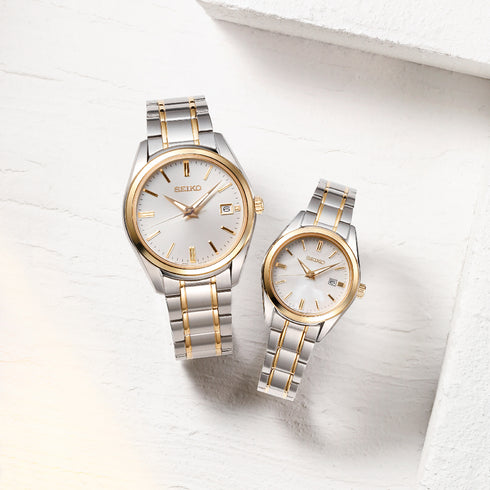 Reloj de cuarzo Seiko SUR312P1 para hombre: acero bicolor, esfera blanca y zafiro.