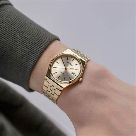CASIO & VINTAGECasio MTP - B145G - 9AVEF Men's Analog Watch – Gold Dial with Stainless Steel BraceletWATCHESEcecile