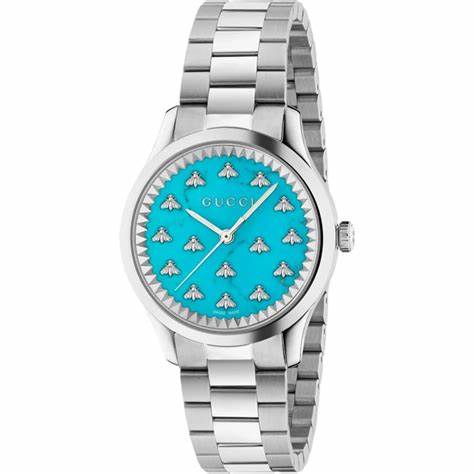 Montre Gucci G-Timeless YA1265044 pour femme - cadran en pierre turquoise avec motif abeille, bracelet en acier inoxydable