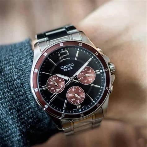 CASIO & VINTAGECasio MTP - 1374D - 5AVDF Men's Stainless Steel Watch – Black Dial, Brown AccentsWATCHESEcecile