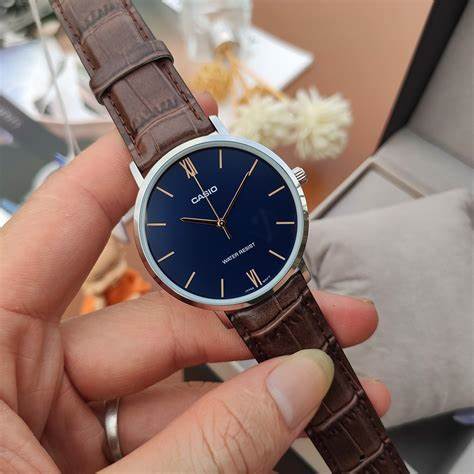 CASIO & VINTAGECasio MTP - VT01L - 2BUDF Men's Watch - Blue Dial, Brown Leather BandWATCHESEcecile