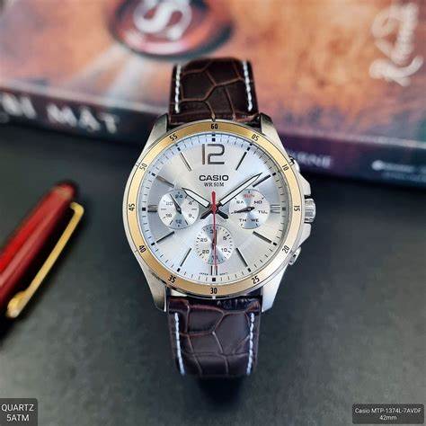 CASIO & VINTAGECasio MTP - 1374L - 7A1VDF Men's Watch - Silver Dial, Brown Leather StrapWATCHESEcecile