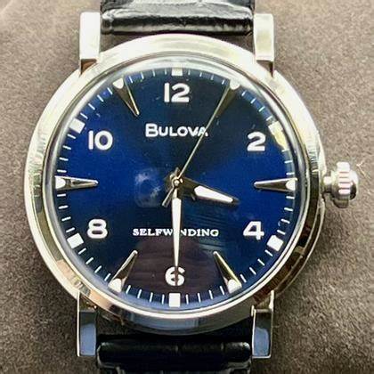 Bulova American Clipper 96A242 Herren-Automatikuhr - 39 mm Edelstahlgehäuse, blaues Zifferblatt, schwarzes Lederarmband