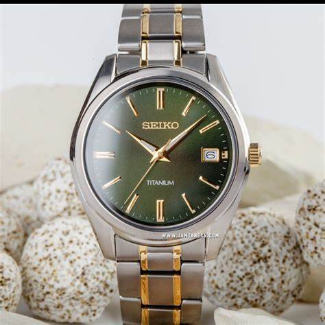 SEIKOSeiko SUR377P1 Men's Titanium Quartz Watch, Green Dial, Two - Tone Titanium BraceletWATCHESEcecile
