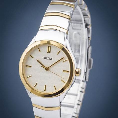 SEIKOSeiko SUR550P1 Women's Quartz Watch, Beige Dial, Two - Tone Stainless Steel BraceletWATCHESEcecile