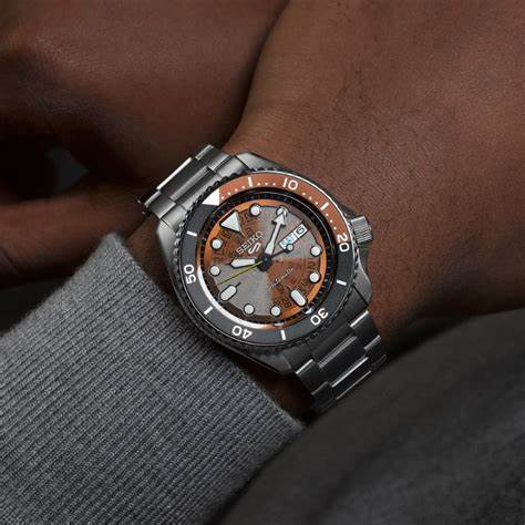 SEIKOSeiko 5 Sports SRPJ47K1 Men's Automatic Watch, Translucent Orange Dial, Stainless Steel BraceletWATCHESEcecile