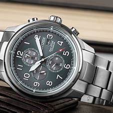 Citizen CA0810-88X Cronógrafo Eco-Drive para hombre, esfera verde, brazalete de supertitanio