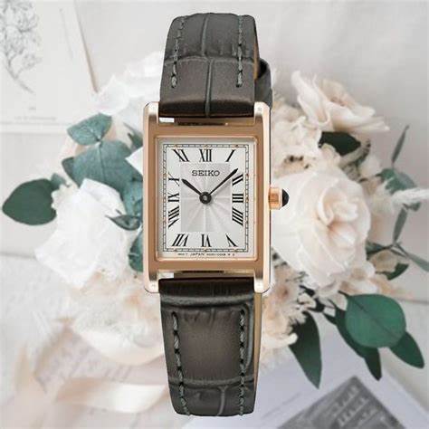 Orologio al quarzo Seiko SWR096P1 da donna, quadrante bianco, cassa in oro rosa, cinturino in pelle grigio