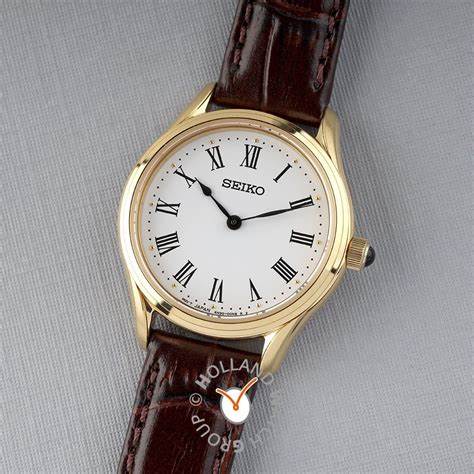 Seiko SWR072P1 Reloj de cuarzo para mujer, esfera blanca, caja dorada, correa de piel marrón