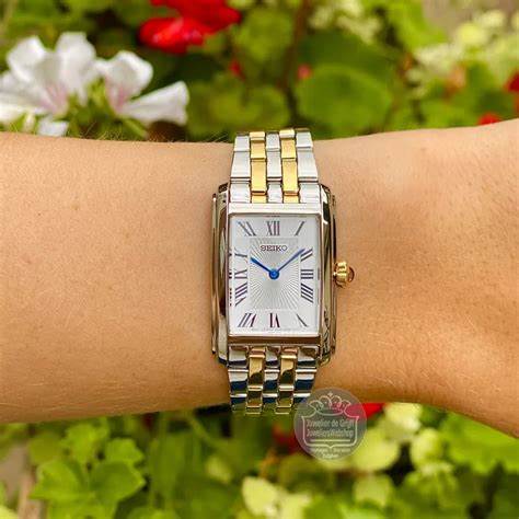 Seiko SWR087P1 Montre à quartz pour femmes, cadran blanc, bracelet en acier inoxydable bicolore