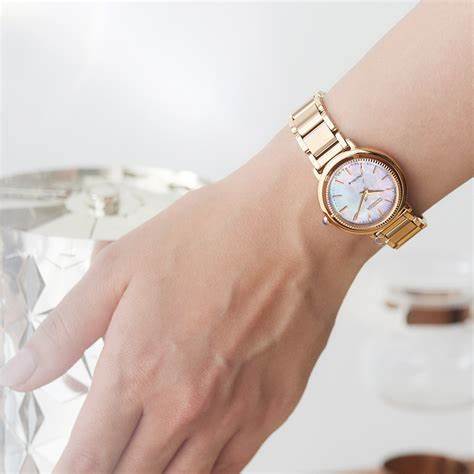 Reloj Citizen L EM1103-86Y Eco-Drive para mujer - 31mm esfera nacarada, brazalete de acero inoxidable tono oro rosa