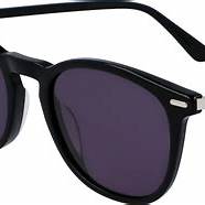 Calvin Klein CK22533S 220 52 Unisex runde Sonnenbrille - brauner Havanna-Rahmen, blaue Gläser