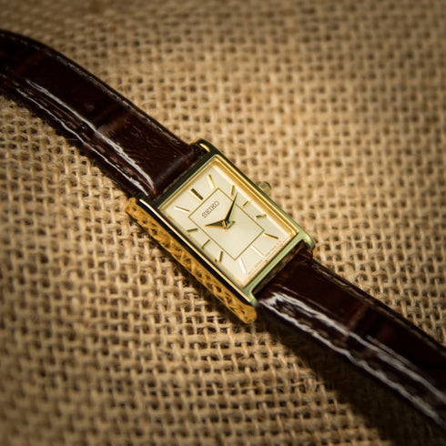 Seiko SWR066P1 Women's Watch – Gold Rectangular Case, Brown Leather Strap