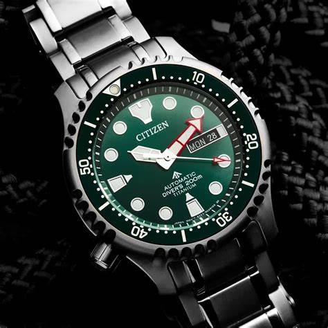 Citizen NY0100-50X Men's Watch - Green Dial, Super Titanium Case and Bracelet