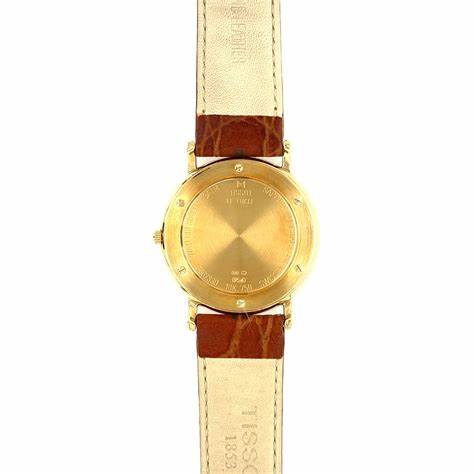 Tissot Carson T71.3.429.13 Herren Quarzuhr, weißes Zifferblatt, Gehäuse aus 18K Gelbgold, Lederarmband